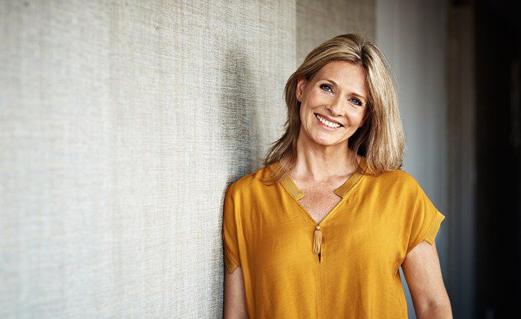 a woman smiling
