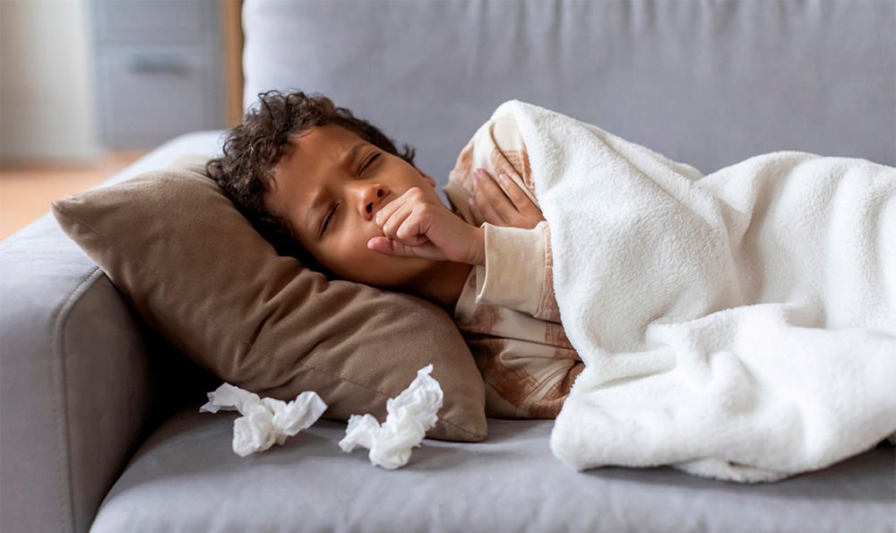 Boy sick with whooping cough.