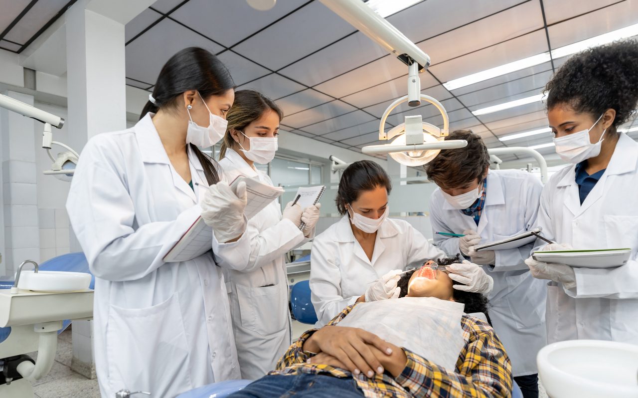Students learning about dental procedures