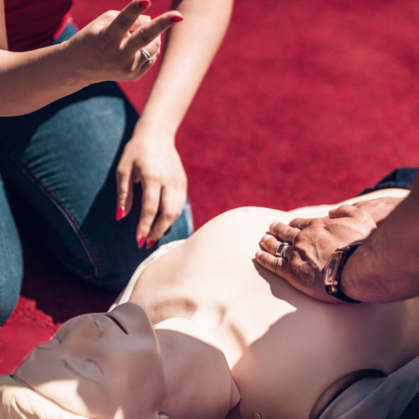 First Aid Training Outdoors. Cardiopulmonary resuscitation. First aid course.