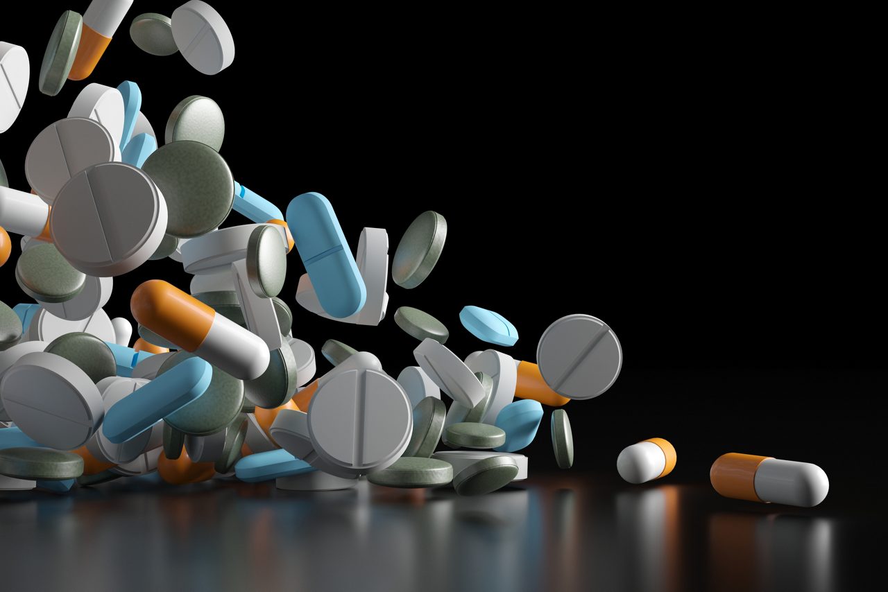 Different medicines on surface. Assorted pharmaceutical pills.