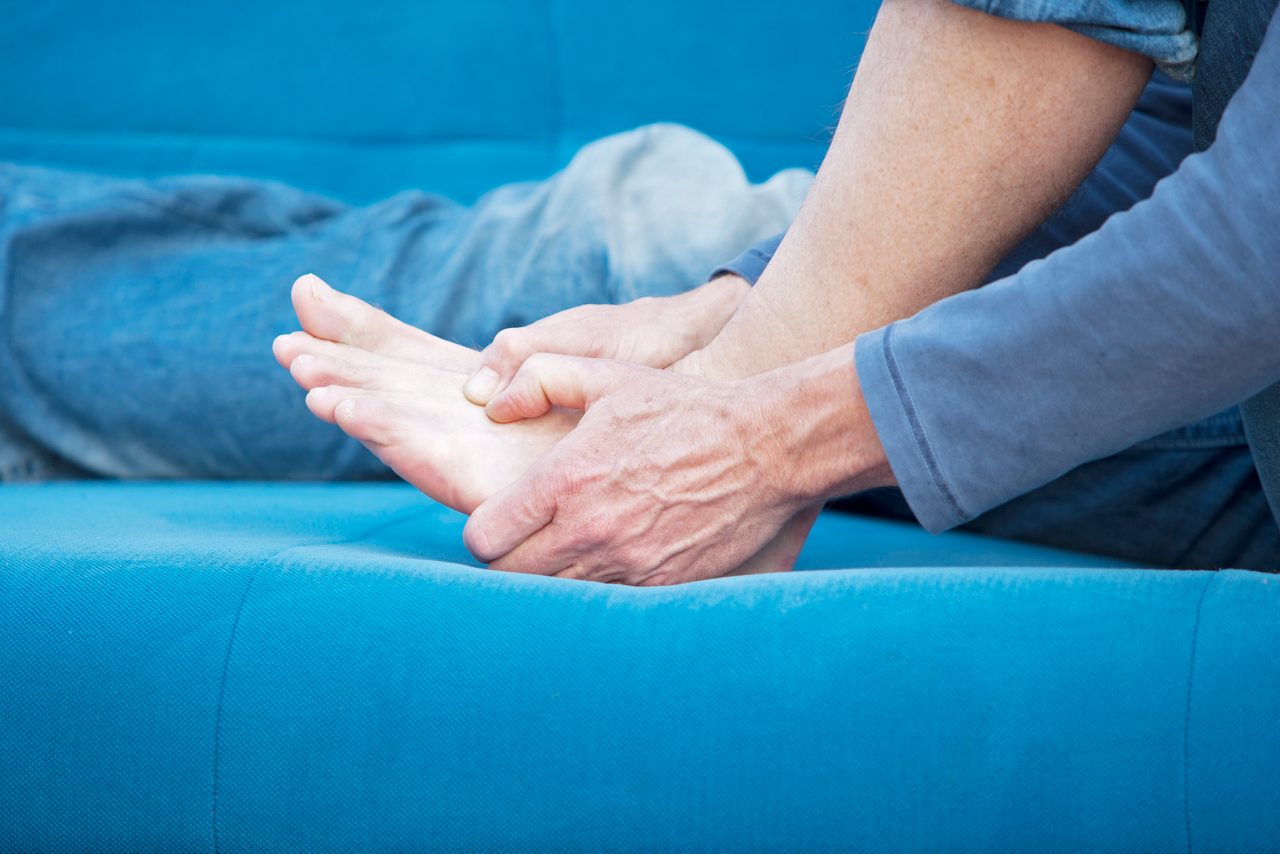 A male person, having metatarsal pain in his left foot. XXL size image.