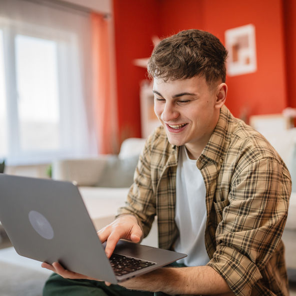 young man student work from home or study from laptop