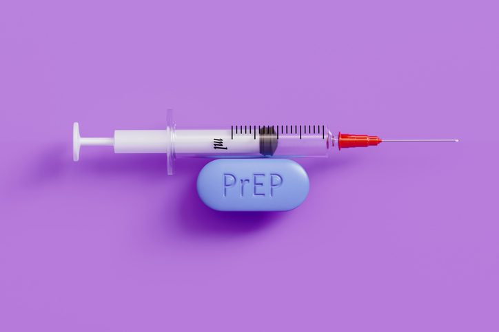 HIV prep medicine and syringe on purple background. HIV prevention concept.