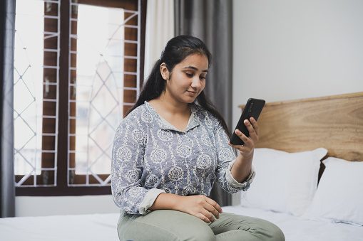 Woman looking at her smartphone