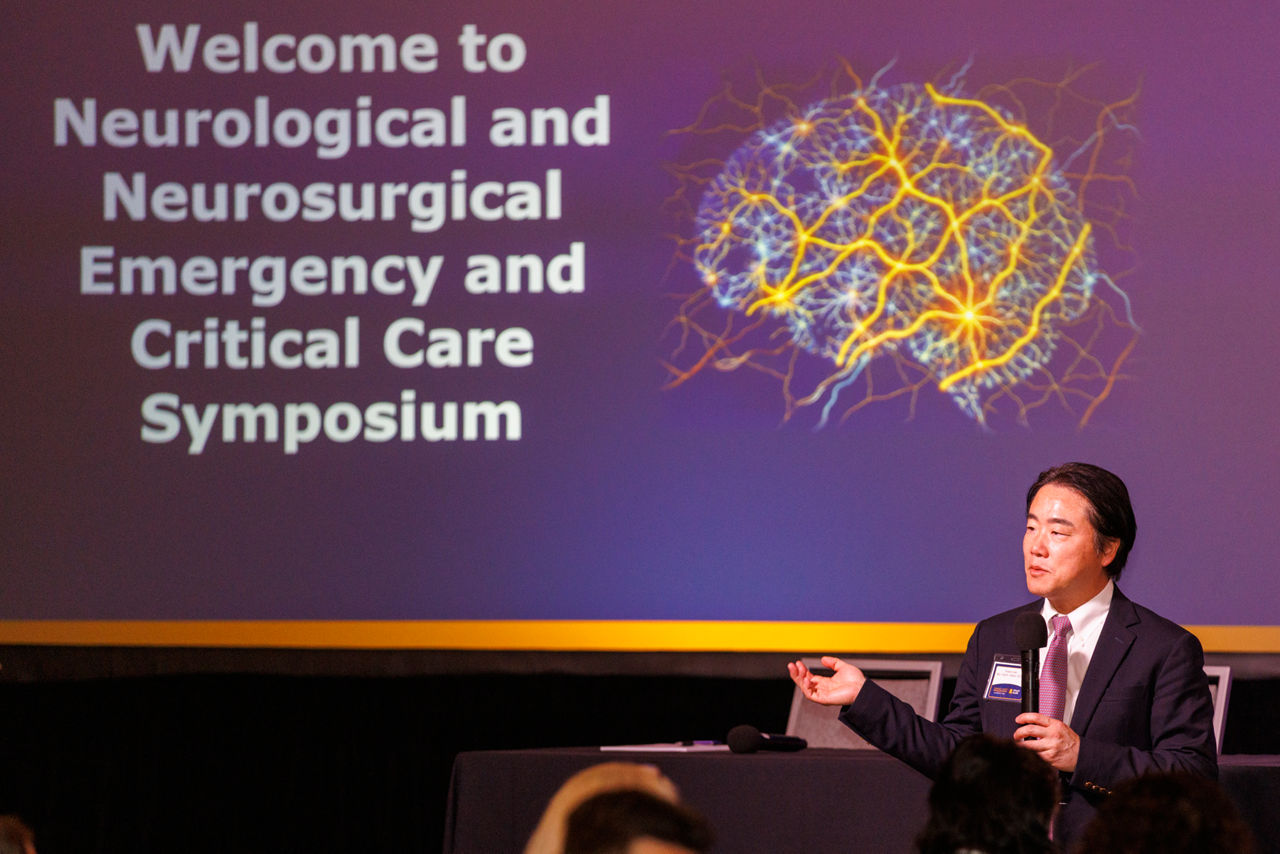 Dr. Lee speaking at the symposium.