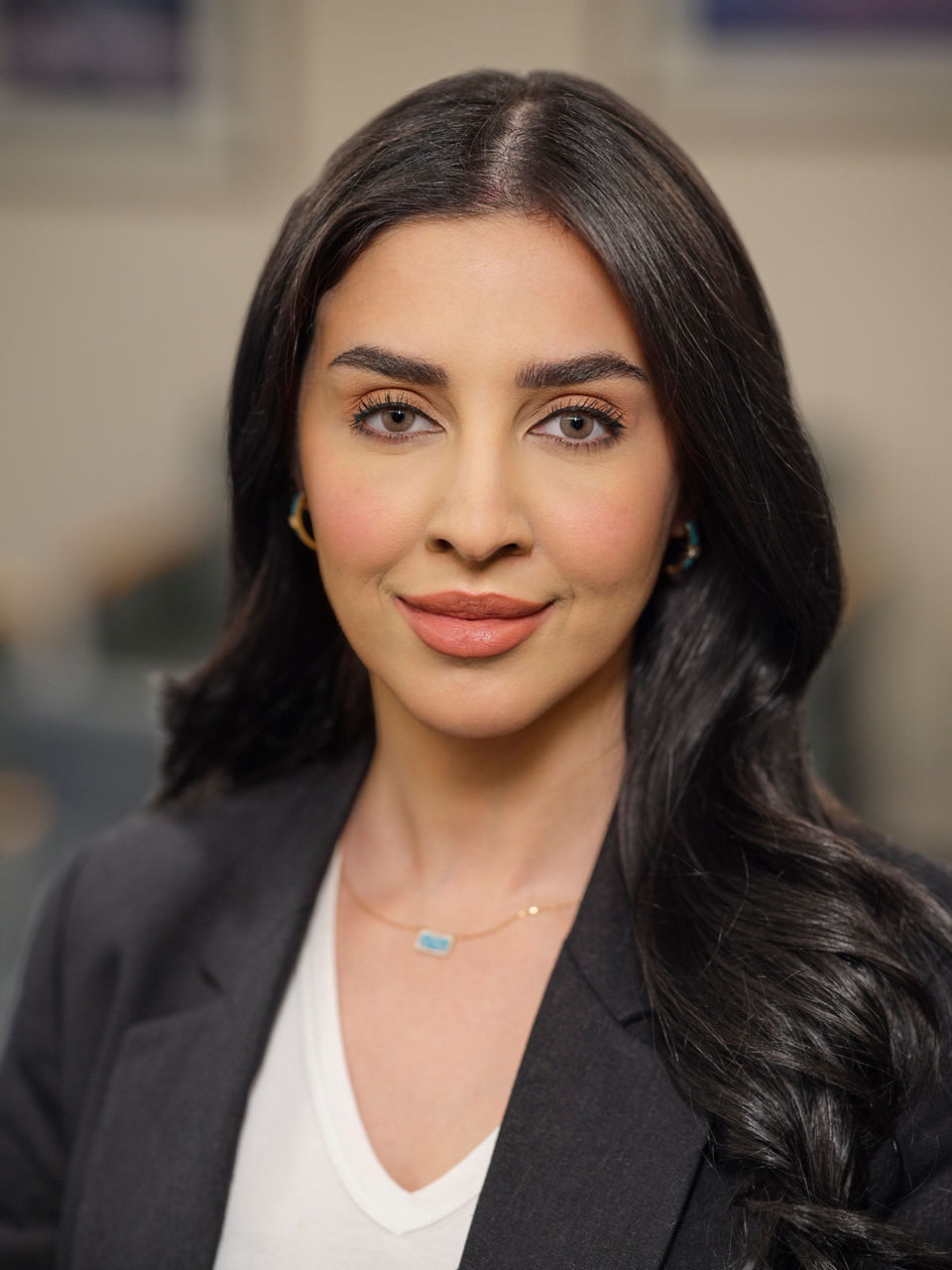 Taif Almansouri,  MD