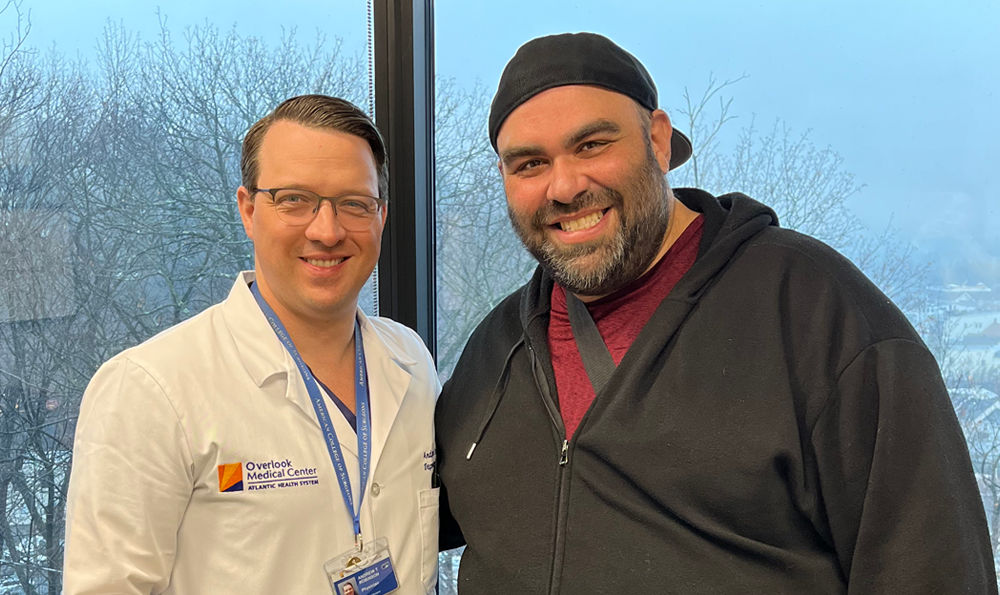 Dr. Andrew Robinson and his hernia surgery patient, Ben. 