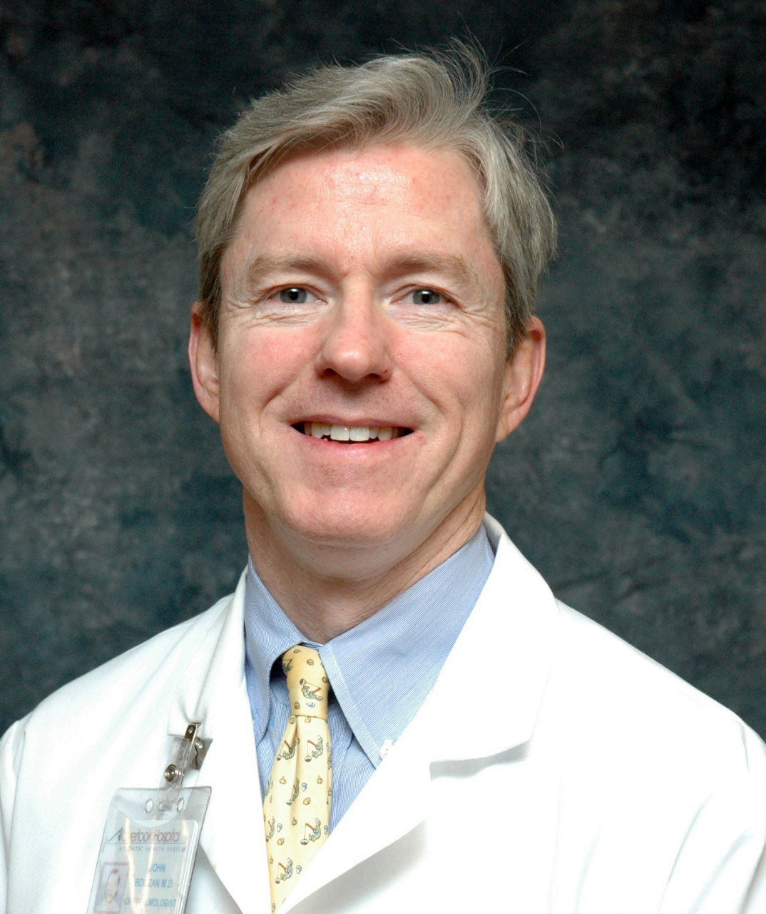 John M Boozan,  MD