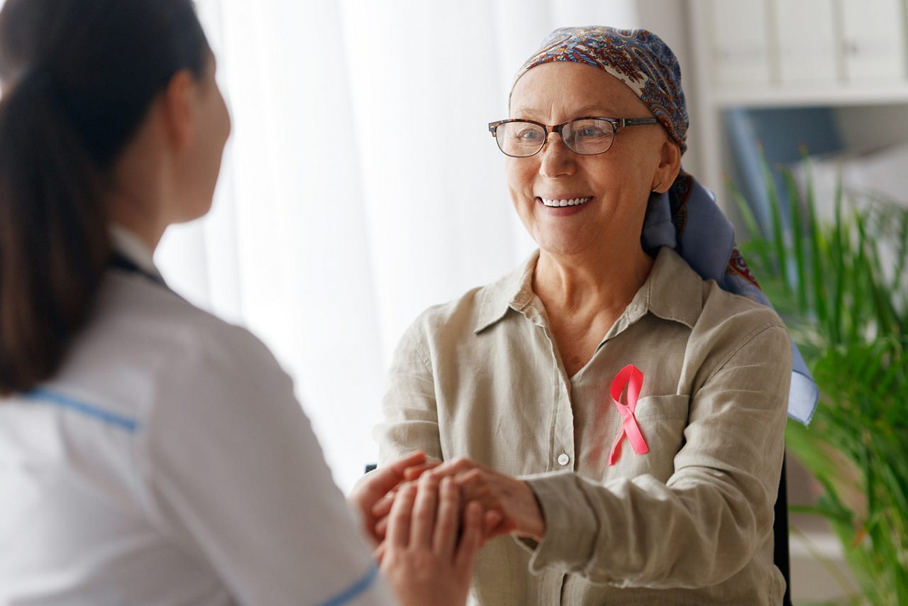 Woman with breast cancer receiving support.