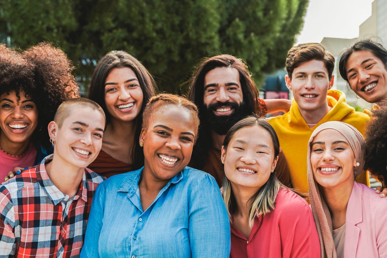 Multiethnic diverse group of people having fun outdoors.