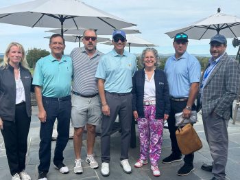 Golfers posing at the Golf Classic.