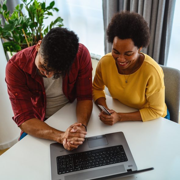 African-American taking total joint preparation class online.