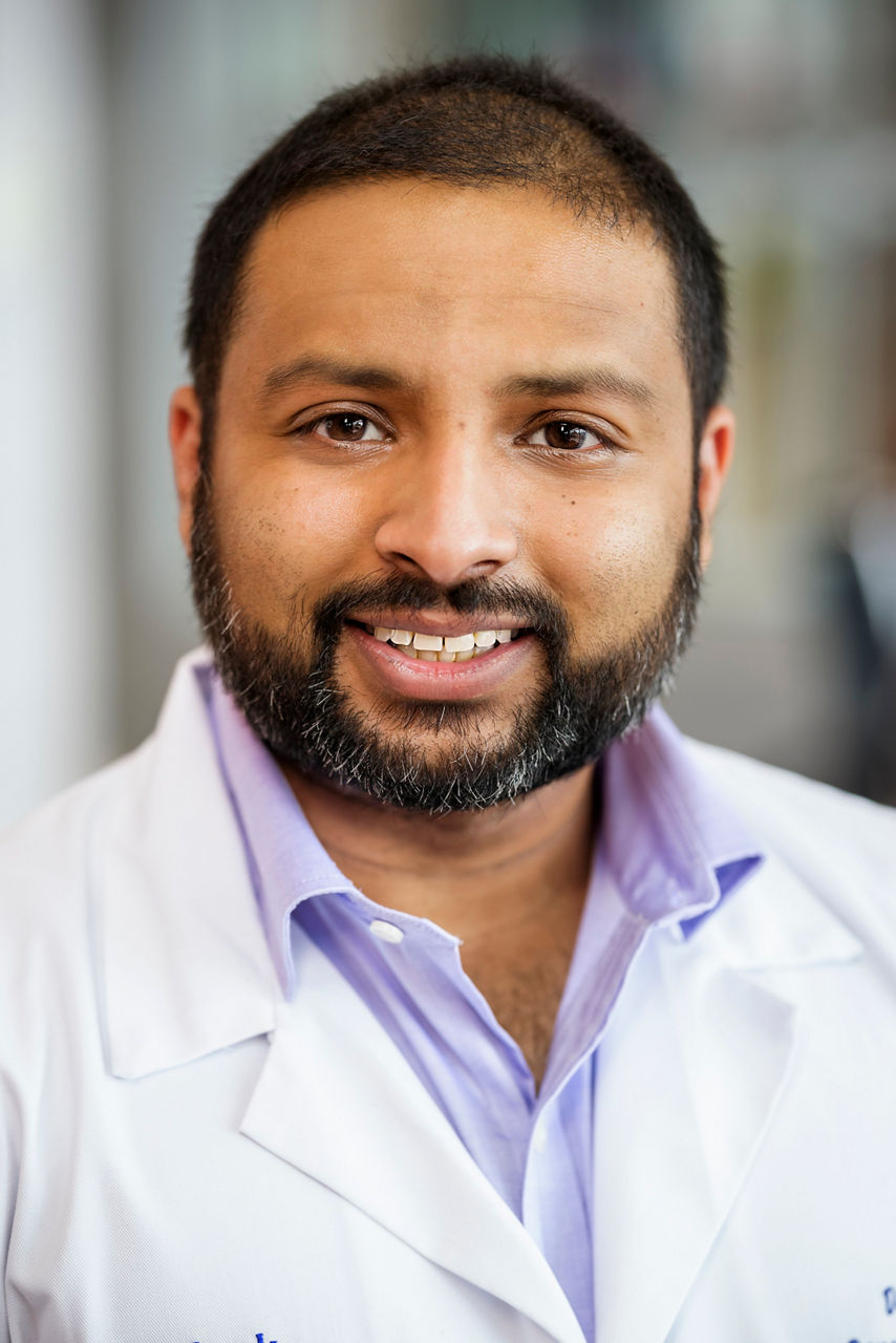 Alex Maharaj,  MD