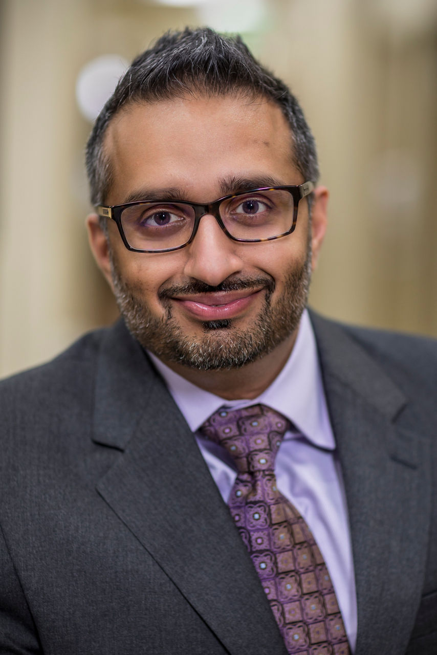 Navpreet Minhas,  MD