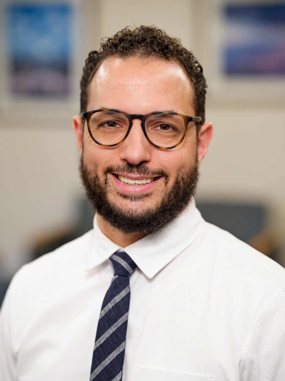 Akram N Mustafa,  MD