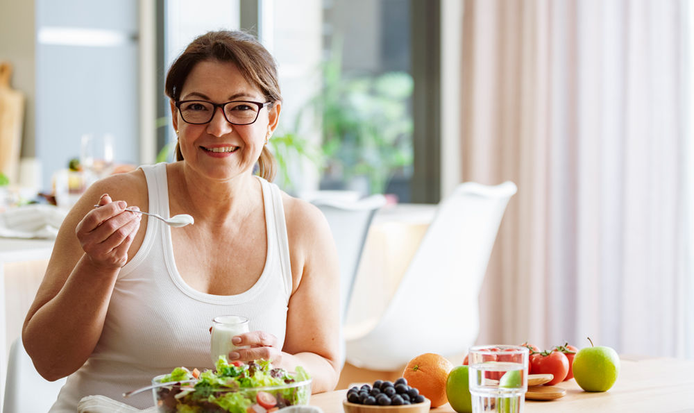 A woman eating a healthy meal