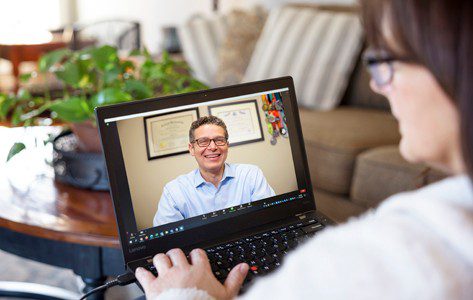 patient watching live webinar