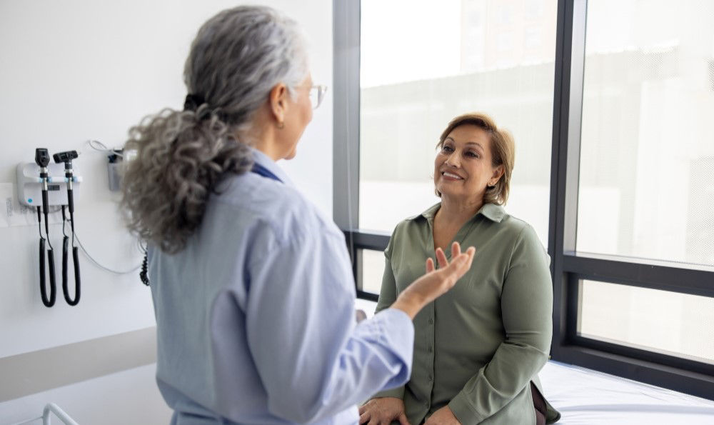 Woman speaking to her doctor.