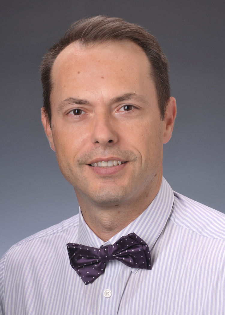 Dan V. Sandru,  MD